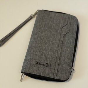 Gray RFID blocking travel organizer with storage for all your travel items New!